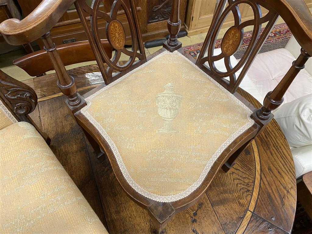 A Victorian carved mahogany framed prie dieu and an Edwardian inlaid mahogany corner elbow chair